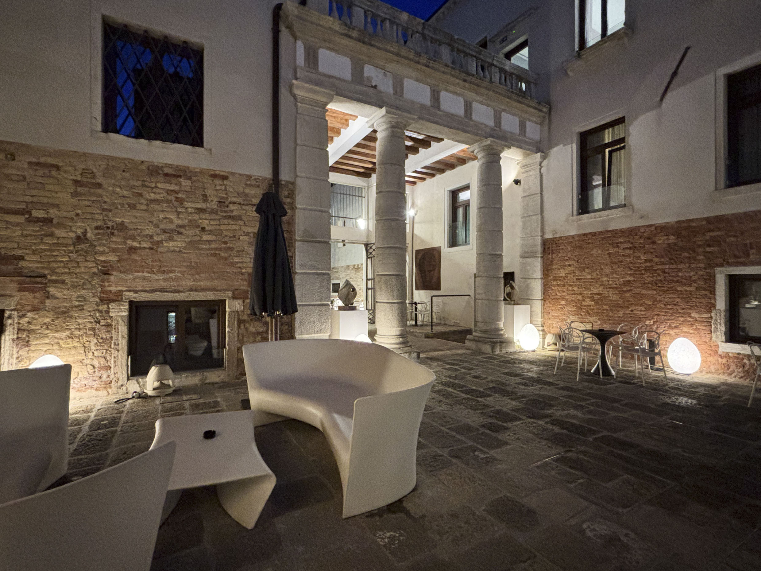 The historic courtyard of Hotel Aquarius Venice at night